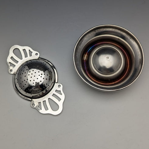 British vintage silver plate tea strainer