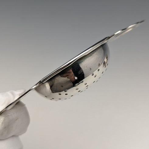 British vintage silver plate tea strainer