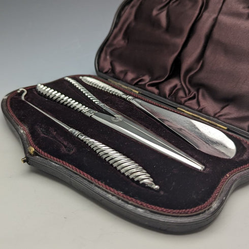 Circa 1892 British antique sterling silver handle accessory set in case