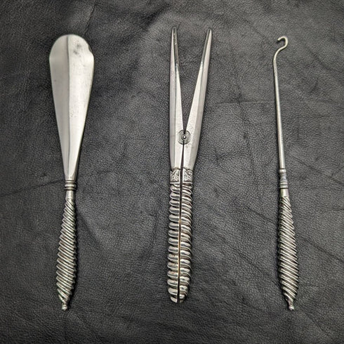 Circa 1892 British antique sterling silver handle accessory set in case