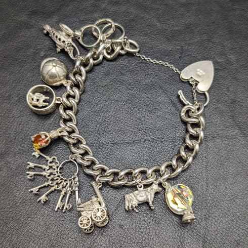 British vintage sterling silver charm bracelet 71g
