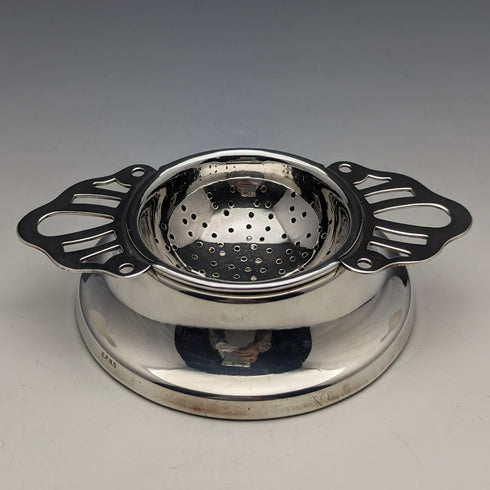 British vintage silver plate tea strainer