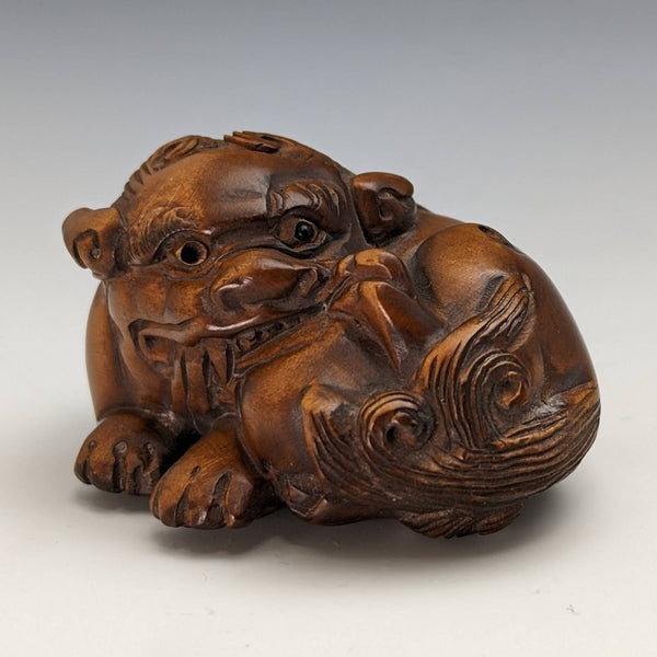 Japanese vintage lion wooden netsuke