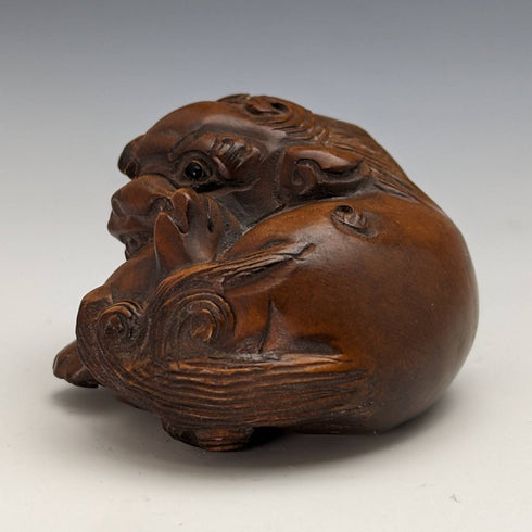 Japanese vintage lion wooden netsuke