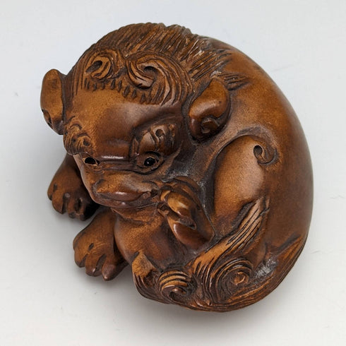 Japanese vintage lion wooden netsuke