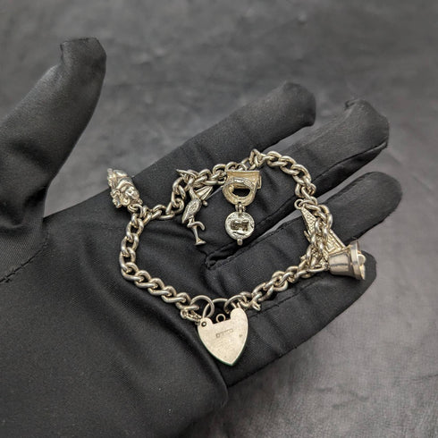British vintage sterling silver charm bracelet 28g