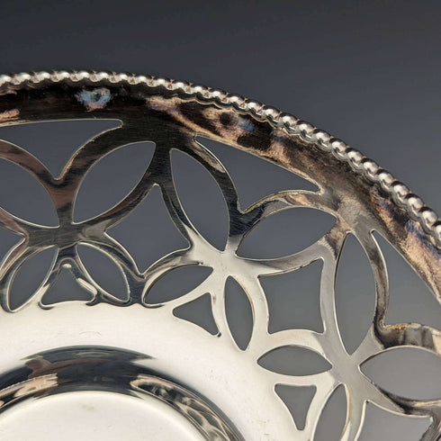 British vintage silver plate dish with blue glass liner