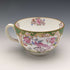 First half of the 20th century British Minton Teacup Trio Cockatrice Green with translation